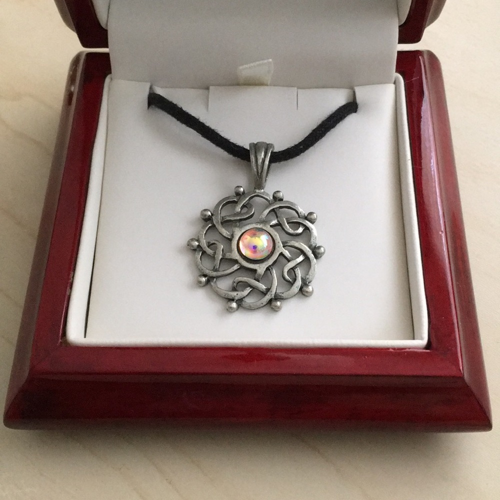 Beautiful design with opal center stone